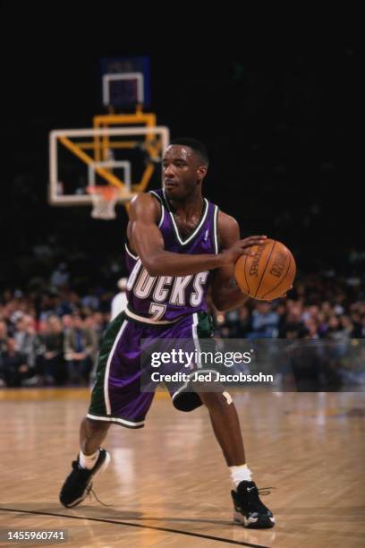 Terrell Brandon, Point Guard for the Milwaukee Bucks dribbles the basketball down court during the NBA Pacific Division basketball game against the...