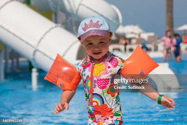 staying safe in the sun - kids swim caps stock pictures, royalty-free photos & images