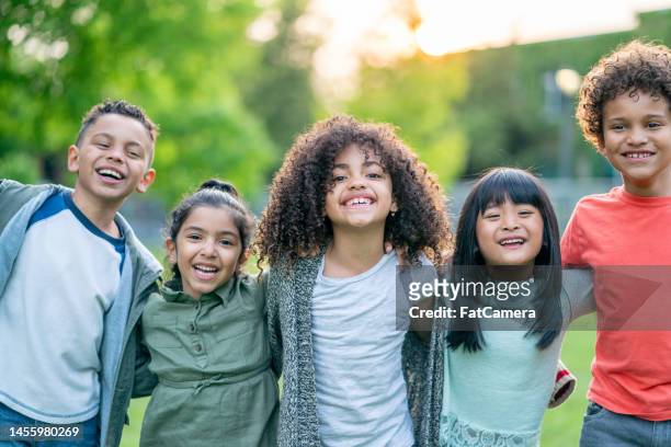 outdoor children's portrait - group of kids stock pictures, royalty-free photos & images