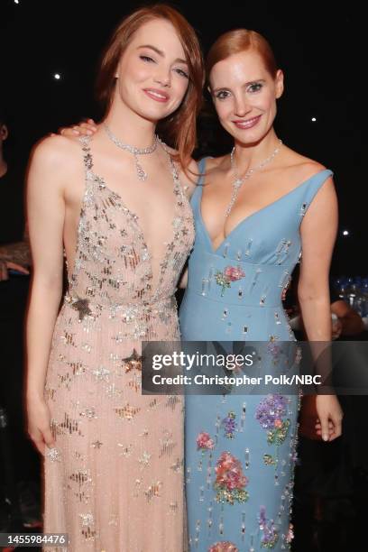 74th ANNUAL GOLDEN GLOBE AWARDS -- Pictured: Actresses Emma Stone and Jessica Chastain at the 74th Annual Golden Globe Awards held at the Beverly...