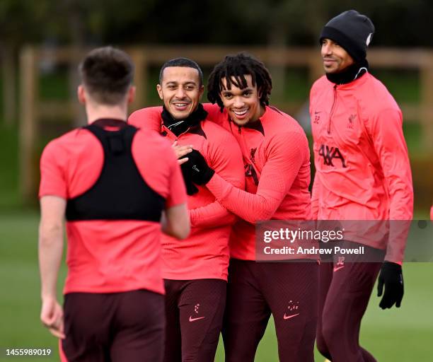 Thiago Alcantara and Trent Alexander-Arnold of Liverpool during a training session at AXA Training Centre on January 12, 2023 in Kirkby, England.