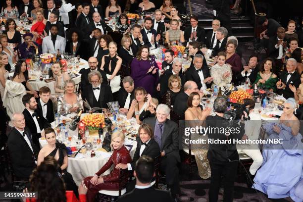 76th ANNUAL GOLDEN GLOBE AWARDS -- Pictured: Sandra Oh and Andy Samberg speak onstage in front of guests such as Bill Murray; Lucas Hedges; Linda...