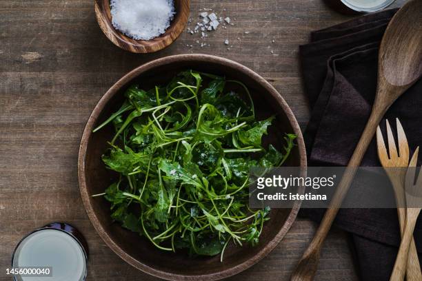 bowl of arugula salad, healthy vegan plant based meal, snack - arugula stock pictures, royalty-free photos & images