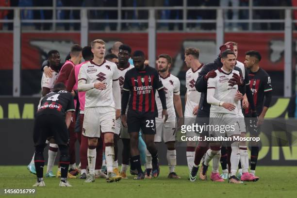 Sasa Lukic of Torino FC is restrained by team mates after a discussion breaks out following the final whistle of the Coppa Italia Round of Sixteen...