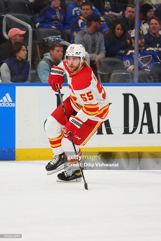 Noah Hanifin of the Calgary Flames skates against the St. Louis Blues ...