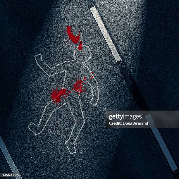 chalk outline of a body and bloodstains on a road - crime scene stock-grafiken, -clipart, -cartoons und -symbole