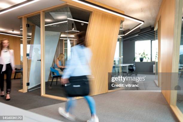 business people walking down the hallway - government relations stock pictures, royalty-free photos & images