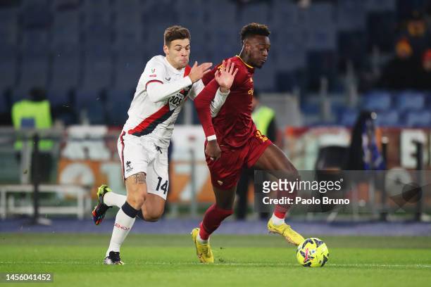 Tammy Abraham of AS Roma battles for possession with Alessandro Vogliacco of Genoa CFC during the Coppa Italia Round of 16 match between AS Roma and...