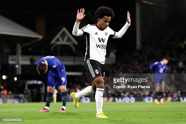 Willian of Fulham celebrates after scoring their team's first goal during the Premier League match between Fulham FC and Chelsea FC at Craven Cottage...