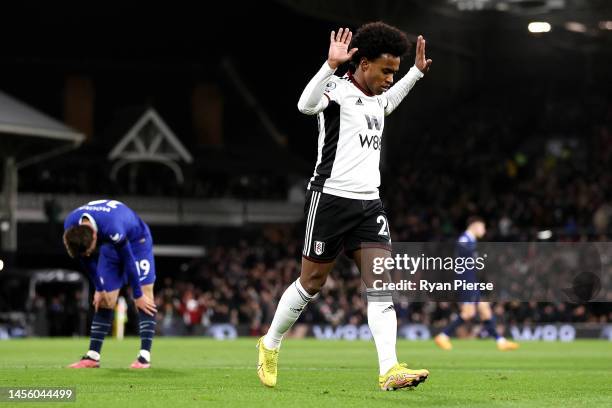 Willian of Fulham celebrates after scoring their team's first goal during the Premier League match between Fulham FC and Chelsea FC at Craven Cottage...