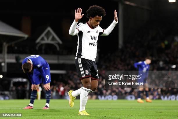 Willian of Fulham celebrates after scoring their team's first goal during the Premier League match between Fulham FC and Chelsea FC at Craven Cottage...
