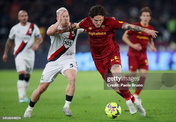 Nicolo Zaniolo of AS Roma battles for possession with Lennart Czyborra of Genoa CFC during the Coppa Italia Round of 16 match between AS Roma and...