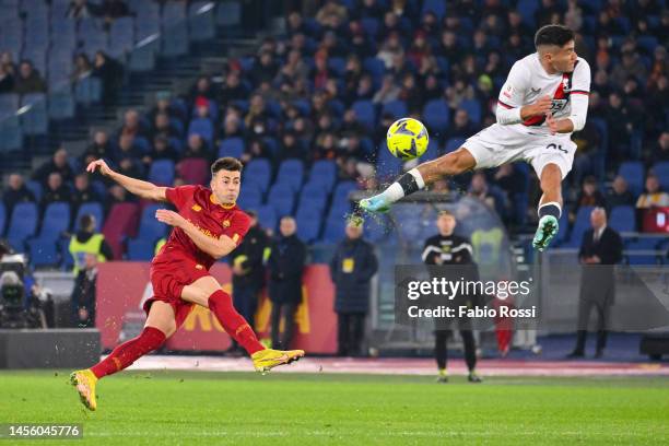 Stephan El Shaarawy of AS Roma kicks the ball against Pablo Galdames of Genoa during the Coppa Italia match between AS Roma and Genoa CFC at Stadio...