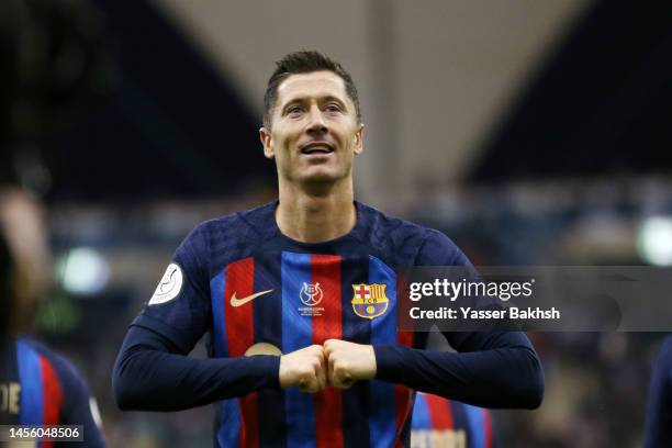 Robert Lewandowski of FC Barcelona celebrates after scoring the team's first goal during the Super Copa de España semi-final match between Real Betis...