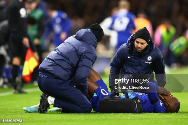 Denis Zakaria of Chelsea receives medical treatment during the Premier League match between Fulham FC and Chelsea FC at Craven Cottage on January 12,...