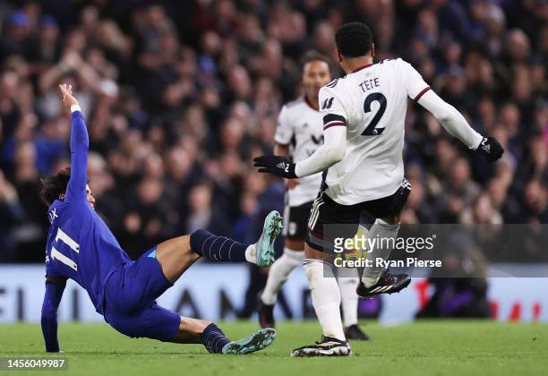 Joao Felix of Chelsea tackles Kenny Tete of Fulham which results in a red card during the Premier League match between Fulham FC and Chelsea FC at...