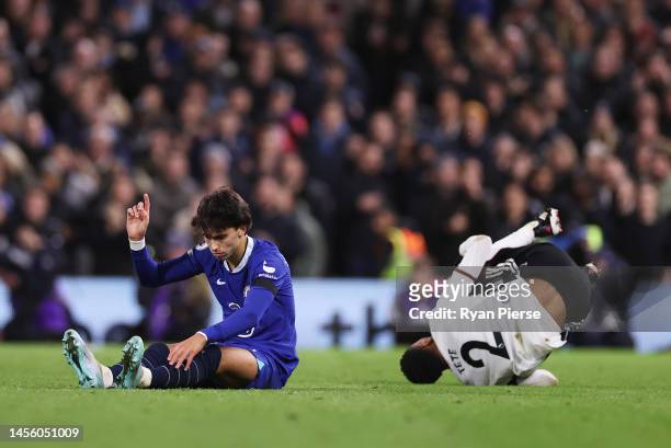 Joao Felix of Chelsea looks on as Kenny Tete of Fulham lies injured following a tackle which resulted in a red card during the Premier League match...