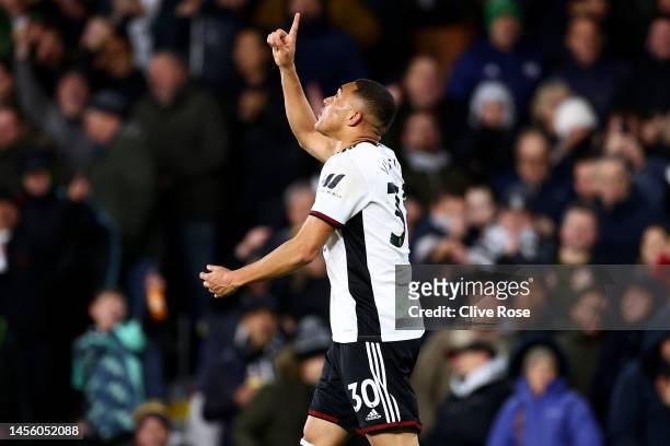 Carlos Vinicius of Fulham celebrates after scoring their sides second goal during the Premier League match between Fulham FC and Chelsea FC at Craven...