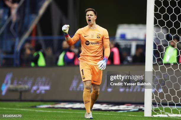 Marc-Andre ter Stegen of FC Barcelona celebrates after saving the third penalty from Juanmi of Real Betis in the penalty shoot out during the Super...