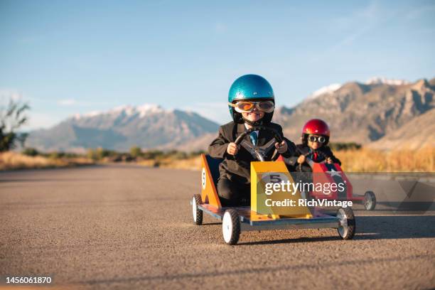 young business racers - go cart stock pictures, royalty-free photos & images