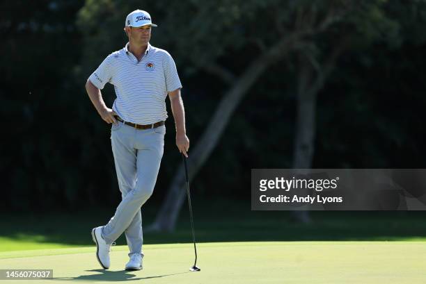 Patton Kizzire of the United States waits to putt on the tenth green during the first round of the Sony Open in Hawaii at Waialae Country Club on...