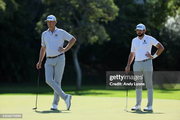 Hayden Buckley of the United States and Patton Kizzire of the United States on the tenth hole during the first round of the Sony Open in Hawaii at...
