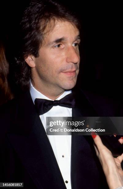 American actor Henry Winkley from the TV show Happy Days attends an event, Los Angeles, California, circa 1985.