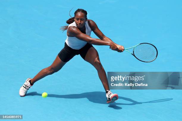 Coco Gauff of the United States plays a backhand during a practice session ahead of the 2023 Australian Open at Melbourne Park on January 13, 2023 in...