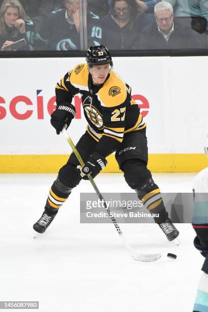 Hampus Lindholm of the Boston Bruins skates against the Seattle Kraken at the TD Garden on January 12, 2023 in Boston, Massachusetts.