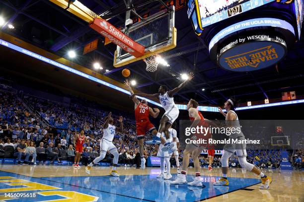 Marco Anthony of the Utah Utes takes a shot against Adem Bona of the UCLA Bruins in the first half at UCLA Pauley Pavilion on January 12, 2023 in Los...