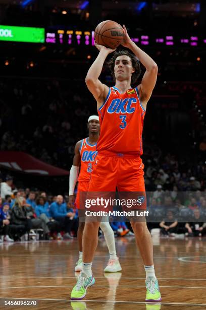 Josh Giddey of the Oklahoma City Thunder shoots a foul shot against the Philadelphia 76ers at the Wells Fargo Center on January 12, 2023 in...