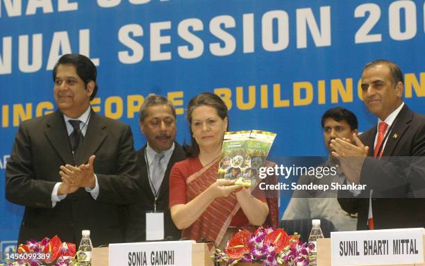 United Progressiv Alliance Chairperson and Congress President Sonia Gandhi releasing a booklets on Healthy and Educated Village Programme at the CII...