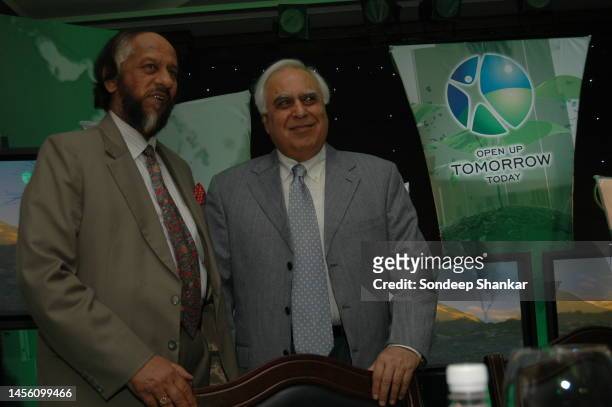 Noble Laureate Dr. R.K. Pachauri with Minister for Science and Technology Kapil Sibal during he launch of Environment Telethon for NDTV in New Delhi.