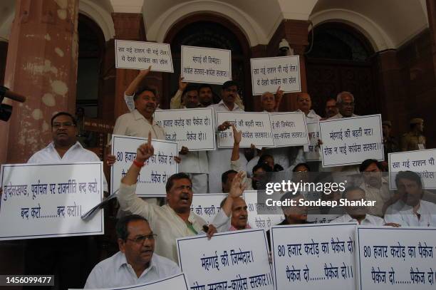 S belonging to he Bahujan Samaj Party block the gates of Parliament, in New Delhi to demand a financial package for the victims of famine effected...