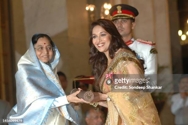Actor Madhuri Dixit receives Civilian Award Padma Shree from President Pratibha Patil at the Presidential Palace in New Delhi on May 10, 2008.