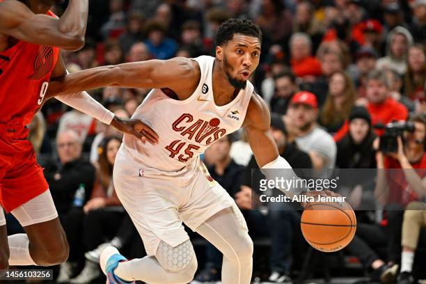 Donovan Mitchell of the Cleveland Cavaliers drives against the Portland Trail Blazers in the fourth quarter at the Moda Center on January 12, 2023 in...
