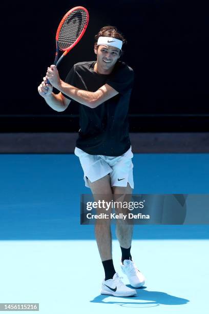 Taylor Fritz of the United States plays a backhand during a practice session ahead of the 2023 Australian Open at Melbourne Park on January 13, 2023...