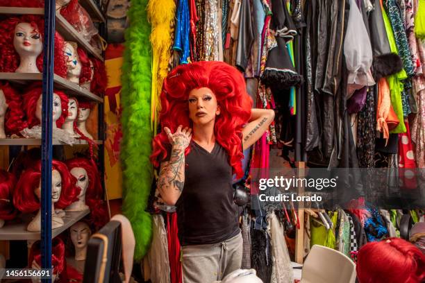 drag queen applying make-up whilst preparing - eccentric character stock pictures, royalty-free photos & images