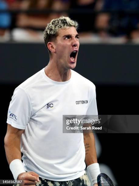 Thanasi Kokkinakis of Australia celebrates a point against Roberto Bautista Agut of Spain during day five of the 2023 Adelaide International at...