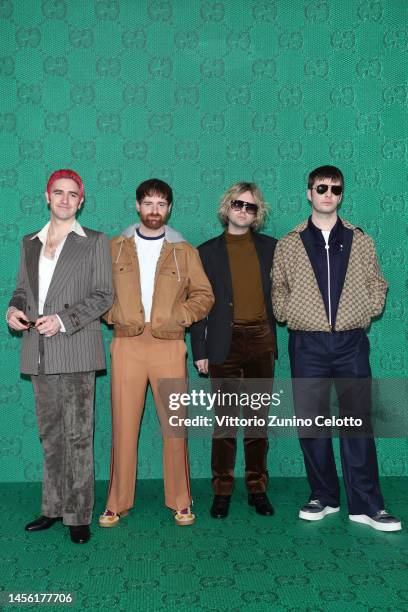 Carlos O'Connell, Tom Coll, Conor Deegan III and Grian Chatten of Fontaines D.C. Arrive at the Gucci show during Milan Fashion Week Fall/Winter...