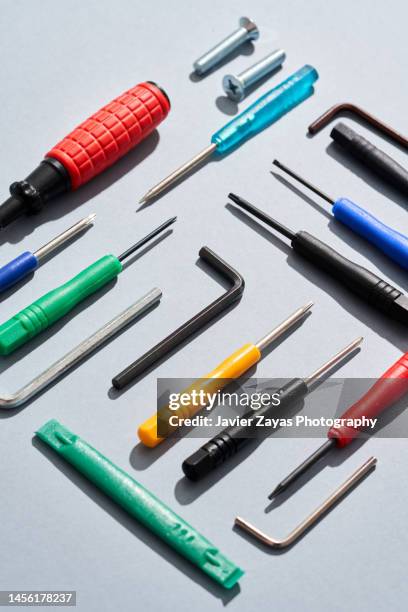 working tools arranged on gray background - werkzeug stock-fotos und bilder