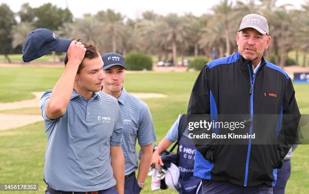 Nicolai Højgaard of Continental Europe speaks with Former Ryder Cup Captain Thomas Bjorn after the Friday Fourball matches of the Hero Cup at Abu...