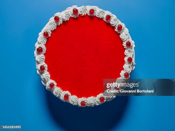 birthday cake with cherry tomatoes and whipped cream - anniversary cake stock pictures, royalty-free photos & images