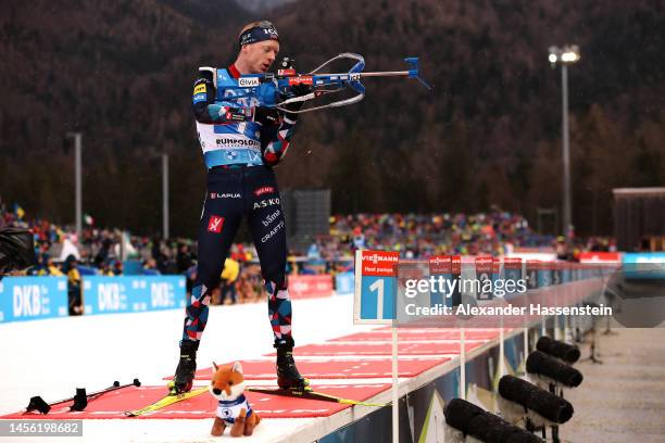 Johannes Thingnes Boe of Norway competes during the Men 4x7.5 km Relay at the BMW IBU World Cup Biathlon Ruhpolding on January 13, 2023 in...