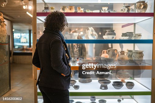 Visitor and Ancient Pottery Visitor and Ancient Pottery