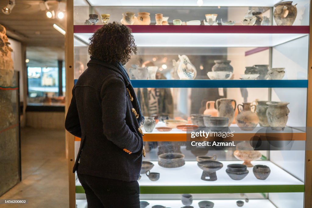 Visitor and Ancient Pottery