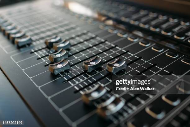 sound mixing desk with sliders and controls, full frame - scoring performance stock pictures, royalty-free photos & images