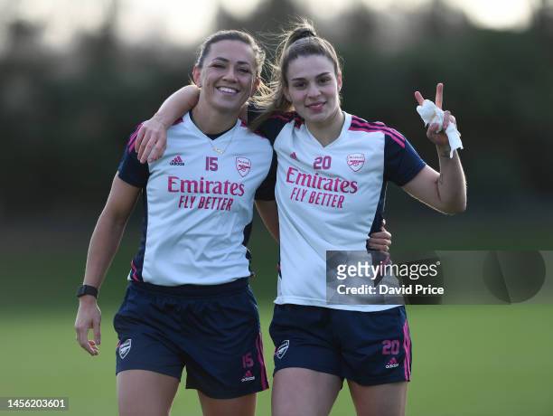 Katie McCabe and Gio Queiroz of Arsenal during the Arsenal Women's training session at London Colney on January 13, 2023 in St Albans, England.