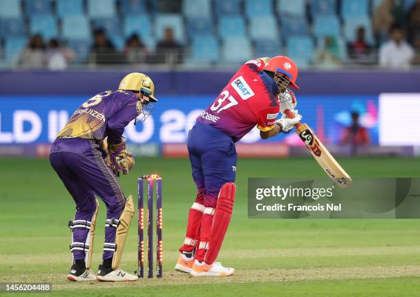 Robin Uthappa of Dubai Capitals is bowled by Sunil Narine of Abu Dhabi Knight Rider during the DP World ILT20 2023 match between Dubai Capitals and...