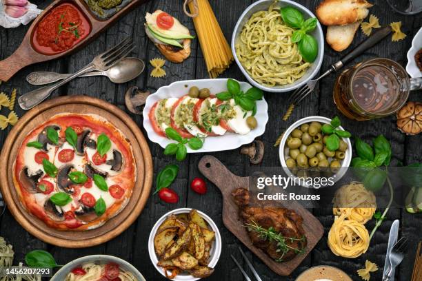 dinner party table full of food - full stock pictures, royalty-free photos & images